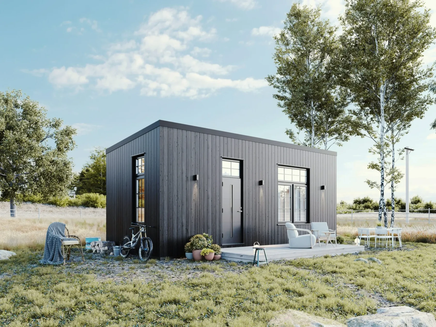 Mikrohus_Pulpet_Panorama_30.2P_Eksteriør_Svart_fasade_stående_panel_svart_ytterdør_vinduer_sprosser_veranda