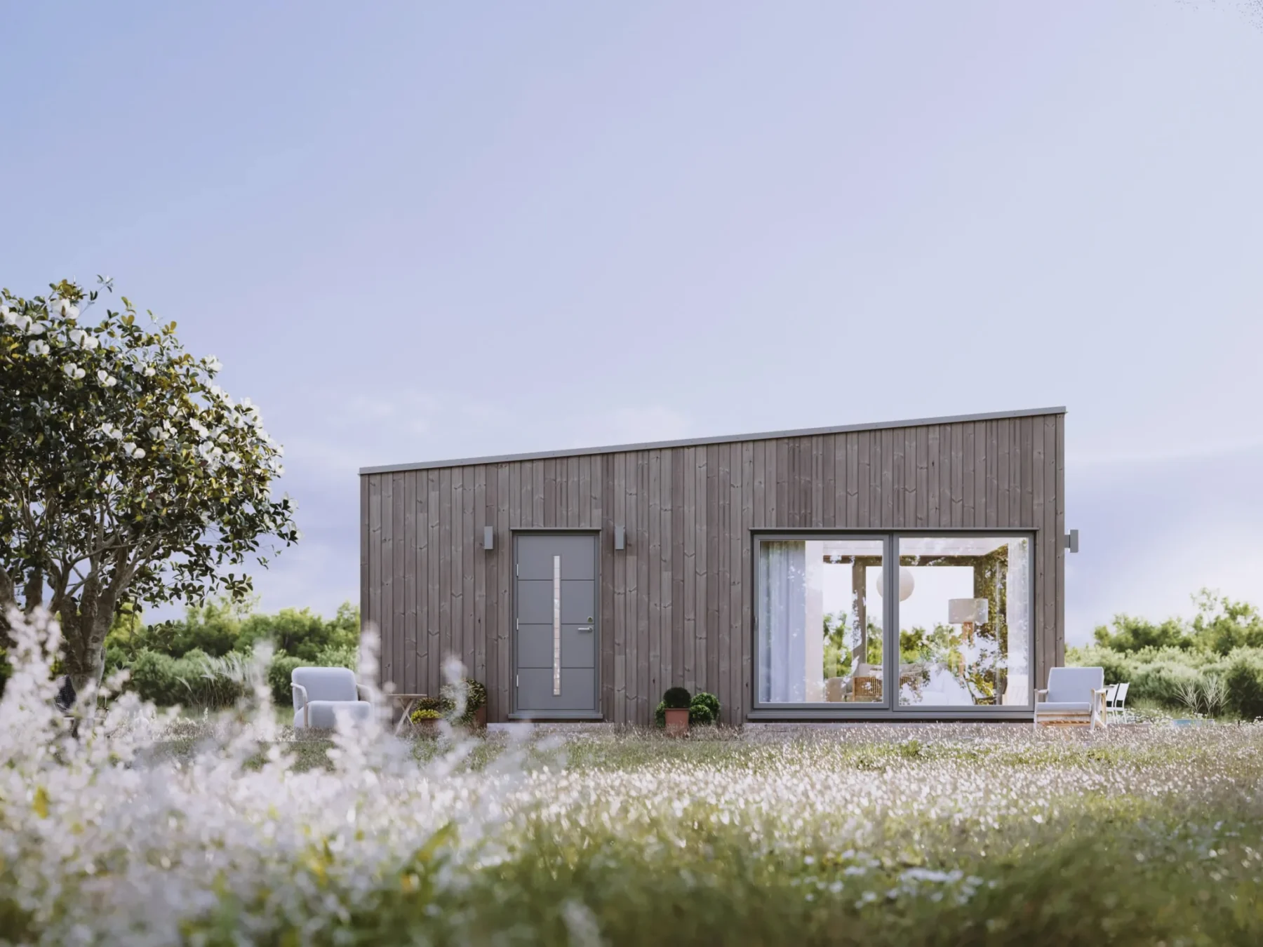 Mikrohus_Pulttak_uten_hems_30.1_Eksteriør_Jernvitriol_fasade_stående_panel_grå_ytterdør_vinduer_veranda