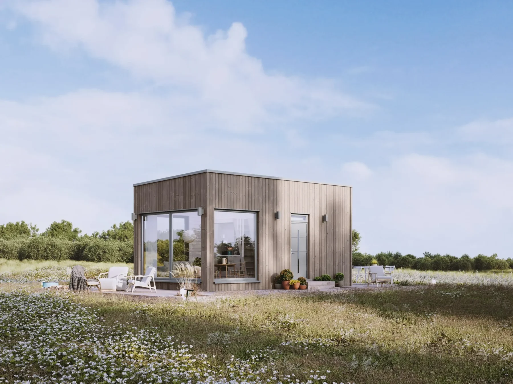 Mikrohus_Rak_30.5_Eksteriør_Jernvitriol_fasade_stående_panel_grå_ytterdør_vinduer_terrasse_store_vinduer