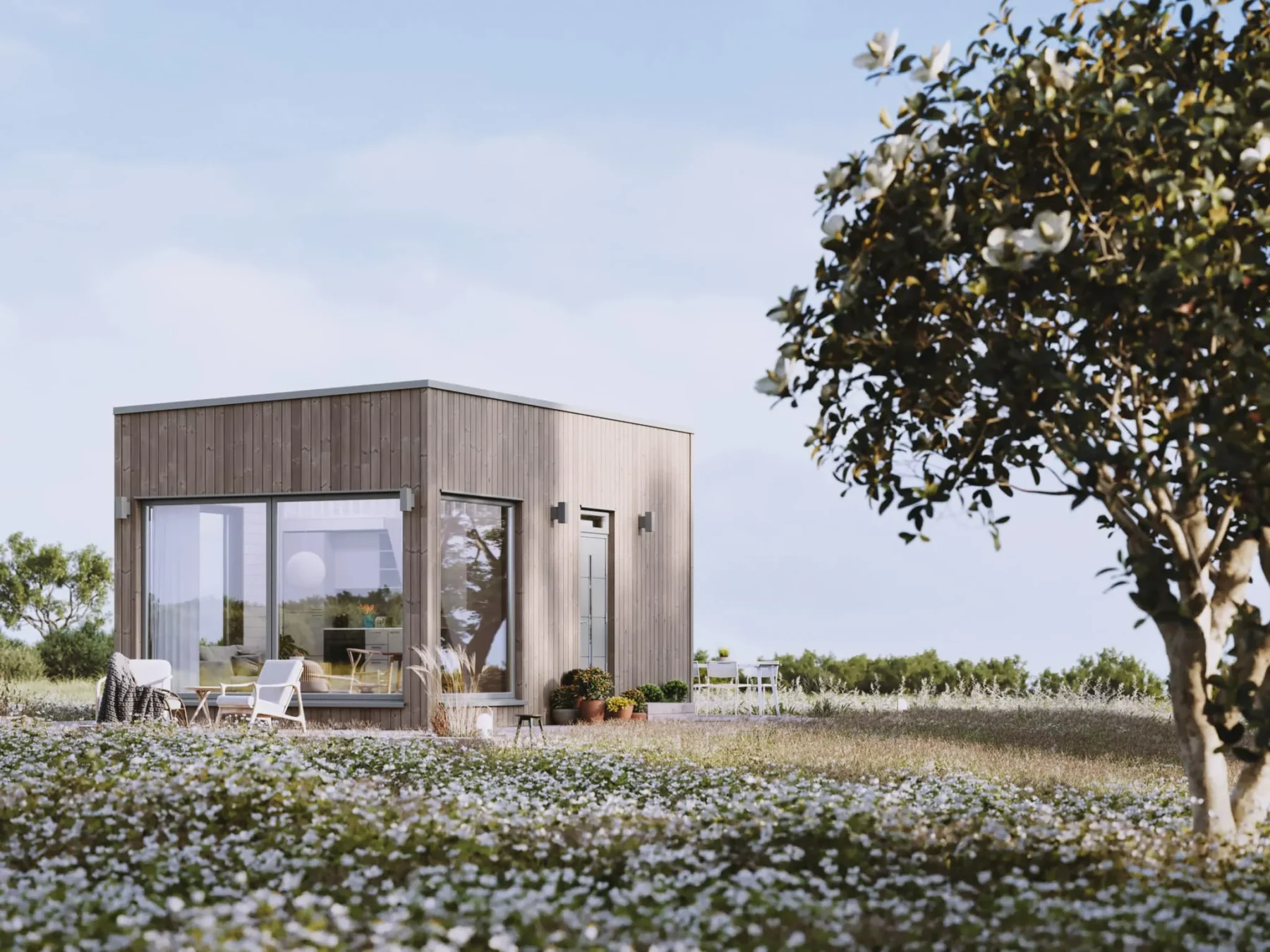 Mikrohus_Rak_30.5_Eksteriør_Jernvitriol_fasade_stående_panel_grå_ytterdør_vinduer_terrasse_store_vinduer