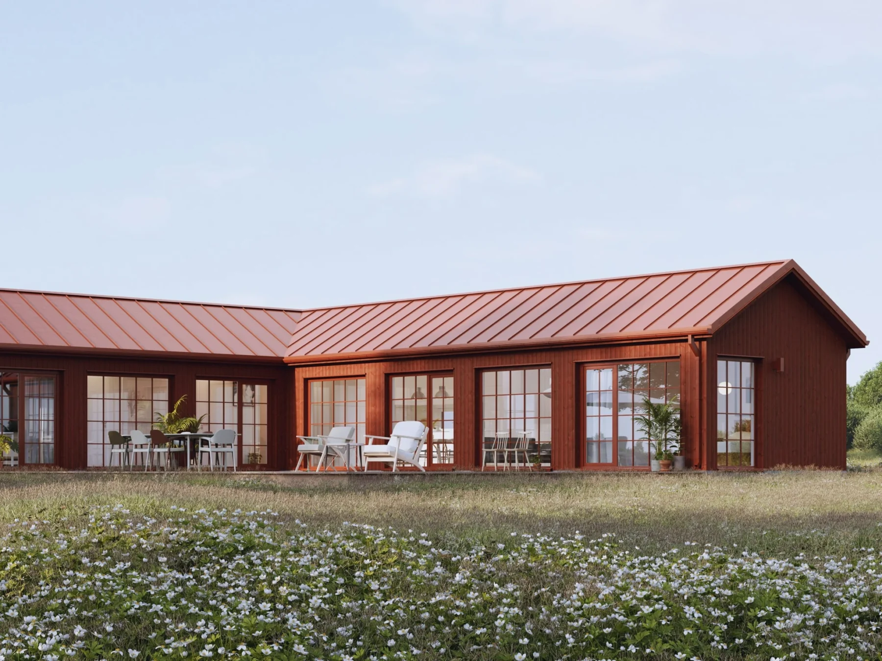 Helårsbolig_Klassisk_100.5K.L_Exterior_rød_fasade_stående_panel_store_vinduer_sprosser_terrasse_platetak