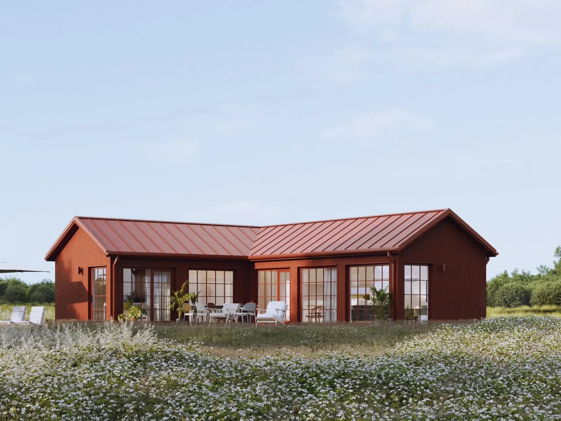Helårsbolig_Klassisk_80.5K.L_Exterior_rød_fasad_stående_panel_terasse_store vinduer_plåttak_sprosser